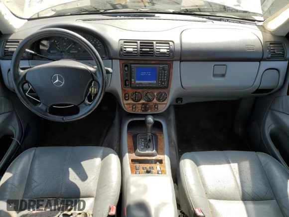 2000 Mercedes-Benz M-Class with VIN 4JGAB54E5YA165660, listed as a Copart auction lot 65872364 with 115,668 mi miles and Salvage Title. Bid and sale history available at carsss.com. Image 8.