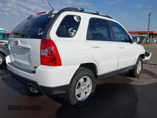 2009 Kia Sportage LX with VIN KNDJF723197622517, listed as a IAAI auction lot 41771268 with 127,112 mi miles. Bid and sale history available at carsss.com. Image 4.