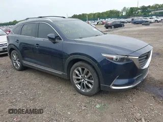 2018 Mazda CX-9 Grand Touring with VIN JM3TCBDY8J0209737, listed as a IAAI auction lot 42374826 with Not provided miles and . Bid and sale history available at DreamBid. Image 1.