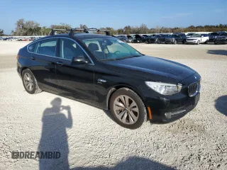 2012 BMW 5 Series GT 535i Gran Turismo xDrive with VIN WBASP2C52CC338622, listed as a Copart auction lot 77604564 with 110,876 mi miles and Salvage Title. Bid and sale history available at DreamBid. Image 4.