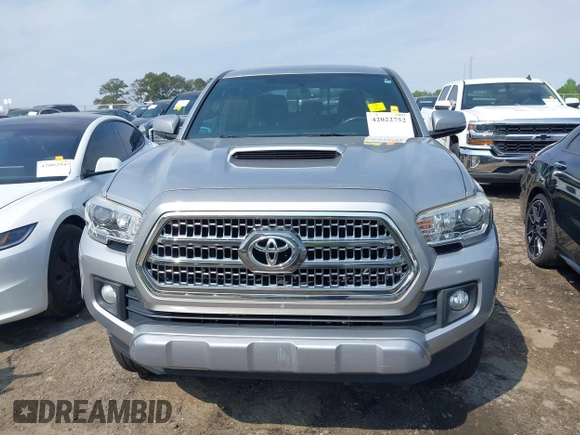 2017 Toyota Tacoma SR5 with VIN 5TFAZ5CN3HX042874, listed as a IAAI auction lot 42022752 with 104,013 mi miles and . Bid and sale history available at carsss.com. Image 12.