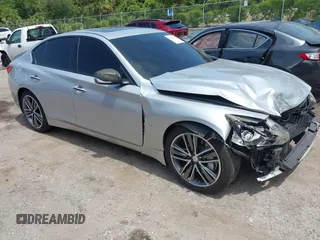 2015 Infiniti Q50 Premium z VIN JN1BV7AP8FM335266, wystawiony jako IAAI lot #42373495 z przebiegiem 128 143 mil mil oraz . Historia ofert i sprzedaży dostępna na DreamBid. Obrazek 1.
