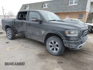 2019 Ram 1500 Rebel z VIN 1C6SRFLT6KN599362, wystawiony jako IAAI lot #41560018 z przebiegiem Nie podano mil oraz . Historia ofert i sprzedaży dostępna na DreamBid. Obrazek 1.