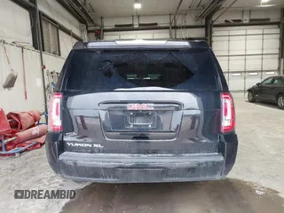 2018 GMC Yukon XL SLT with VIN 1GKS2GKC5JR346324, listed as a IAAI auction lot 41580164 with 123,640 mi miles. Bid and sale history available at carsss.com. Image 16.
