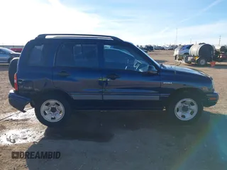 2003 Suzuki Vitara z VIN 2S3TE52V436101091, wystawiony jako IAAI lot #41472279 z przebiegiem 163 429 mil mil oraz . Historia ofert i sprzedaży dostępna na DreamBid. Obrazek 13.