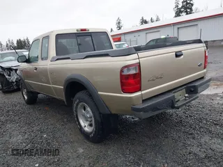2002 Ford Ranger XL z VIN 1FTZR15E92PB61299, wystawiony jako IAAI lot #41471659 z przebiegiem 156 466 mil mil oraz . Historia ofert i sprzedaży dostępna na DreamBid. Obrazek 3.