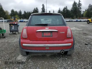 2004 MINI Hardtop with VIN WMWRC33464TJ54261, listed as a Copart auction lot 55150205 with 212,636 mi miles and Salvage Title. Bid and sale history available at DreamBid. Image 6.