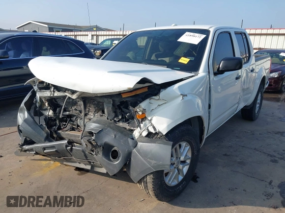 2015 Nissan Frontier Pro-4X with VIN 1N6AD0EV1FN717450, listed as a IAAI auction lot 41898172 with 141,739 mi miles and . Bid and sale history available at DreamBid. Image 2.