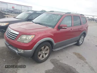 2009 Kia Borrego EX with VIN KNDJH741395010983, listed as a IAAI auction lot 41981799 with 152,278 mi miles. Bid and sale history available at carsss.com. Image 2.