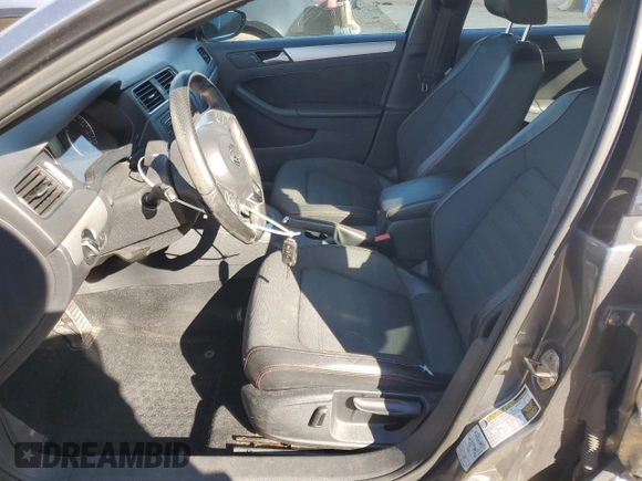 2013 Volkswagen Jetta GLI Autobahn z VIN 3VW4A7AJ0DM221810, wystawiony jako Copart lot #48561895 z przebiegiem 132 921 mil mil oraz Szkoda całkowita • Salvage title. Historia ofert i sprzedaży dostępna na DreamBid. Obrazek 7.