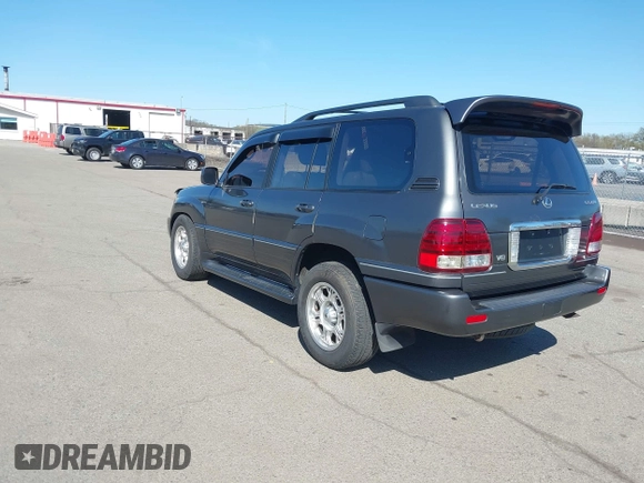 2003 Lexus LX with VIN JTJHT00W033531066, listed as a IAAI auction lot 41969617 with 209,710 mi miles. Bid and sale history available at carsss.com. Image 3.
