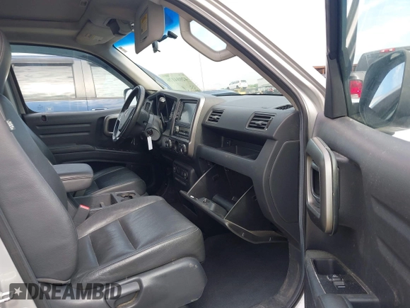 2009 Honda Ridgeline RTL with VIN 2HJYK16539H500986, listed as a IAAI auction lot 42084176 with 161,142 mi miles and . Bid and sale history available at DreamBid. Image 5.