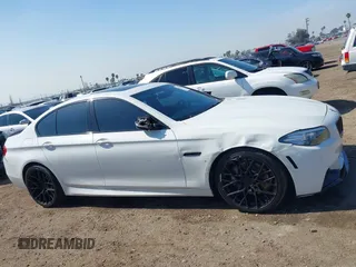 2016 BMW 5 Series 535i with VIN WBA5B1C54GG134991, listed as a IAAI auction lot 41573388 with 91,161 mi miles and . Bid and sale history available at DreamBid. Image 13.