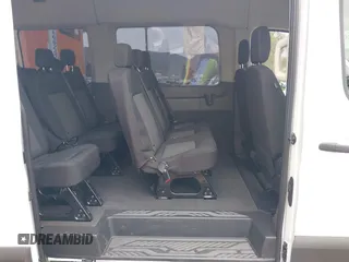 2023 Ford Transit Passenger XL с VIN 1FDAX2C80PKA74557, выставлен на аукционе IAAI как лот 41864316 с пробегом 50 640 миль миль и . История ставок и продаж доступна на DreamBid. Изображение 8.