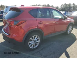 2014 Mazda CX-5 Grand Touring with VIN JM3KE4DY8E0421660, listed as a Copart auction lot 48588525 with 144,939 mi miles and Salvage Title. Bid and sale history available at DreamBid. Image 3.