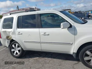 2015 Honda Pilot Touring with VIN 5FNYF3H93FB007766, listed as a IAAI auction lot 41932052 with 131,036 mi miles. Bid and sale history available at carsss.com. Image 13.