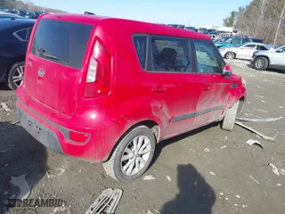 2013 Kia Soul + with VIN KNDJT2A67D7557656, listed as a IAAI auction lot 41304207 with 150,302 mi miles. Bid and sale history available at carsss.com. Image 4.