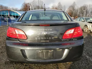 2010 Chrysler Sebring Limited with VIN 1C3CC5FB2AN120496, listed as a Copart auction lot 82131024 with 106,563 mi miles and Salvage Title. Bid and sale history available at carsss.com. Image 6.