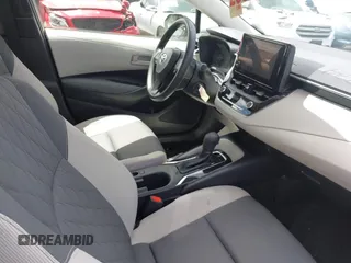 2023 Toyota Corolla LE with VIN JTDB4MEEXPJ002576, listed as a IAAI auction lot 41756334 with 22,919 mi miles and . Bid and sale history available at DreamBid. Image 5.
