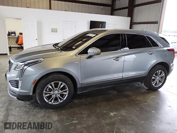 2023 Cadillac XT5 AWD Premium Luxury with VIN 1GYKNDR49PZ222592, listed as a Copart auction lot 79759624 with 32,177 mi miles and Clean Title. Bid and sale history available at DreamBid. Image 1.
