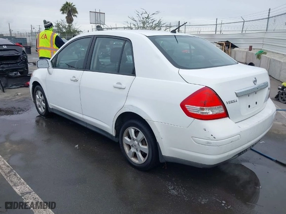 2010 Nissan Versa 1.8 S with VIN 3N1BC1AP2AL368284, listed as a IAAI auction lot 41720152 with 236,210 mi miles. Bid and sale history available at carsss.com. Image 3.