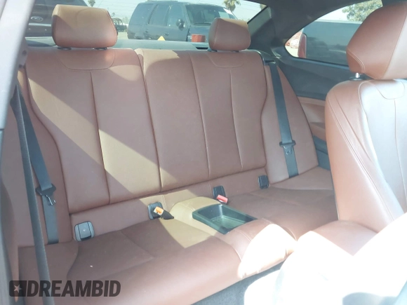 2015 BMW 2 Series 228i with VIN WBA1F9C59FVW98387, listed as a IAAI auction lot 42518807 with 79,848 mi miles and . Bid and sale history available at DreamBid. Image 8.