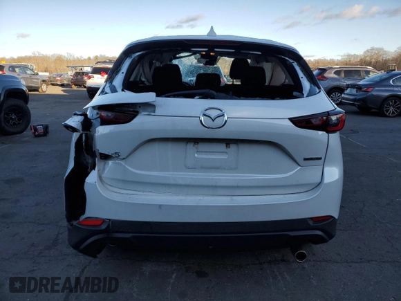 2023 Mazda CX-5 2.5 S with VIN JM3KFBAM6P0269481, listed as a Copart auction lot 87222194 with 21,070 mi miles and Salvage Title. Bid and sale history available at carsss.com. Image 6.