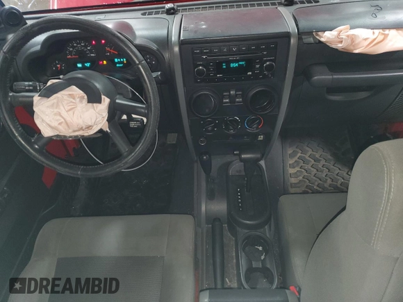 2008 Jeep Wrangler X with VIN 1J4FA24118L501599, listed as a Copart auction lot 52776475 with 74,186 mi miles and Salvage Title. Bid and sale history available at DreamBid. Image 8.