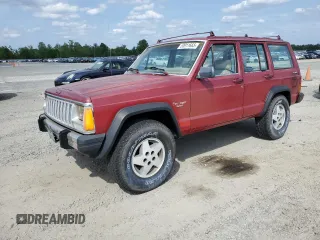 1985 Jeep Cherokee z VIN 1JCUB7826FT165583, wystawiony jako Copart lot #53911665 z przebiegiem 153 583 mil mil oraz Czysty tytuł • Clean title. Historia ofert i sprzedaży dostępna na DreamBid. Obrazek 1.