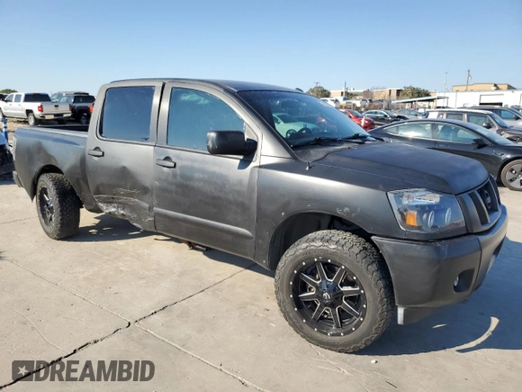 2015 Nissan Titan SL with VIN 1N6AA0ED7FN510609, listed as a Copart auction lot 74371254 with 115,916 mi miles and Salvage Title. Bid and sale history available at carsss.com. Image 4.