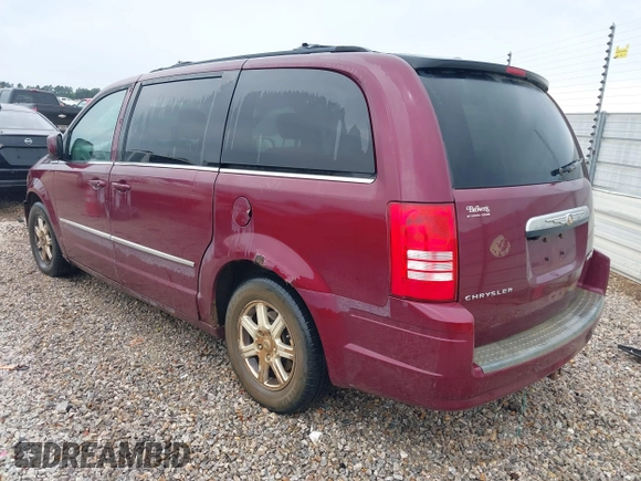 2009 Chrysler Town & Country Touring with VIN 2A8HR54169R618640, listed as a IAAI auction lot 42210905 with 227,420 mi miles and . Bid and sale history available at DreamBid. Image 3.