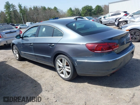 2014 Volkswagen CC Lux with VIN WVWRP7AN7EE501483, listed as a IAAI auction lot 42090985 with 121,737 mi miles. Bid and sale history available at carsss.com. Image 3.