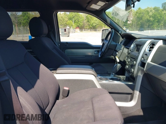2013 Ford F-150 XL with VIN 1FTFW1ET0DFC85741, listed as a IAAI auction lot 42022221 with 156,509 mi miles. Bid and sale history available at carsss.com. Image 5.