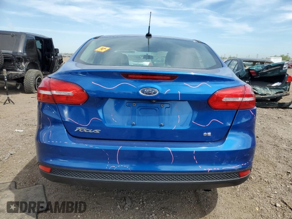 2018 Ford Focus SE z VIN 1FADP3F27JL266774, wystawiony jako Copart lot #56672825 z przebiegiem 51 980 mil mil oraz Szkoda całkowita • Salvage title. Historia ofert i sprzedaży dostępna na DreamBid. Obrazek 6.