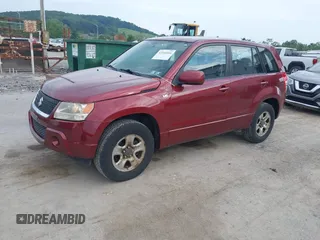 2008 Suzuki Grand Vitara w/Spare & Cargo Covers z VIN JS3TD941784101146, wystawiony jako IAAI lot #42546416 z przebiegiem 83 064 mil mil oraz . Historia ofert i sprzedaży dostępna na DreamBid. Obrazek 2.