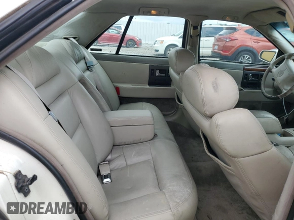 1995 Cadillac Seville Luxury SLS z VIN 1G6KS52Y7SU838169, wystawiony jako Copart lot #67941934 z przebiegiem 144 953 mil mil oraz Szkoda całkowita • Salvage title. Historia ofert i sprzedaży dostępna na DreamBid. Obrazek 10.