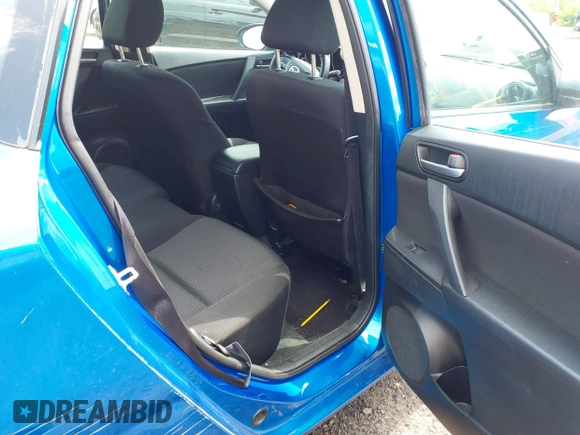 2012 Mazda 3 i Touring z VIN JM1BL1L85C1661934, wystawiony jako IAAI lot #42746228 z przebiegiem 165 386 mil mil oraz . Historia ofert i sprzedaży dostępna na DreamBid. Obrazek 8.