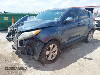 2012 Kia Sportage LX with VIN KNDPB3A2XC7179136, listed as a IAAI auction lot 42298343 with 206,303 mi miles and . Bid and sale history available at DreamBid. Image 2.