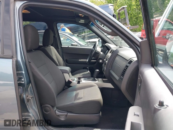 2012 Ford Escape XLT z VIN 1FMCU9DG7CKB91272, wystawiony jako IAAI lot #42168619 z przebiegiem 119 011 mil mil oraz . Historia ofert i sprzedaży dostępna na DreamBid. Obrazek 5.