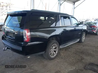 2016 GMC Yukon XL SLE with VIN 1GKS1FKC2GR147222, listed as a IAAI auction lot 41390201 with 86,385 mi miles. Bid and sale history available at carsss.com. Image 4.