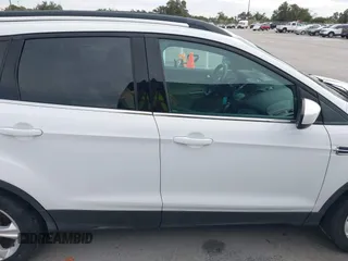 2015 Ford Escape SE with VIN 1FMCU0GX2FUB33893, listed as a IAAI auction lot 41455605 with 128,383 mi miles. Bid and sale history available at carsss.com. Image 13.