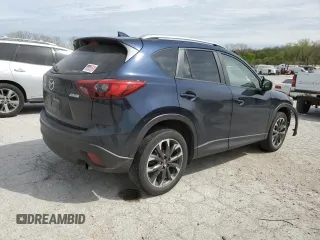 2016 Mazda CX-5 Grand Touring with VIN JM3KE4DYXG0844002, listed as a Copart auction lot 52712035 with 81,042 mi miles and Salvage Title. Bid and sale history available at DreamBid. Image 3.