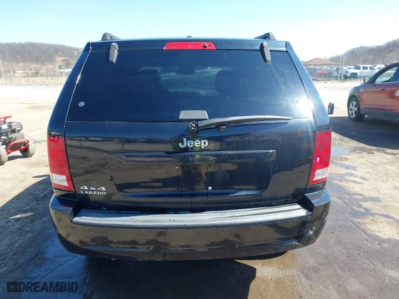 2007 Jeep Grand Cherokee Laredo with VIN 1J8GR48K67C523705, listed as a IAAI auction lot 41774281 with 215,572 mi miles. Bid and sale history available at carsss.com. Image 17.