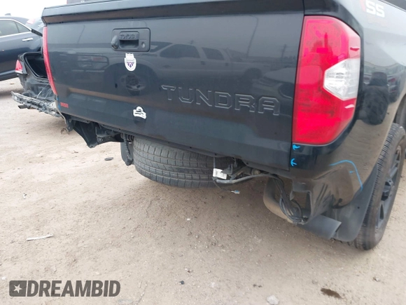 2019 Toyota Tundra SR with VIN 5TFRM5F1XKX143105, listed as a IAAI auction lot 41274567 with 180,602 mi miles and . Bid and sale history available at DreamBid. Image 6.