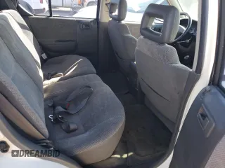 1999 Isuzu Rodeo S z VIN 4S2CM58W0X4306727, wystawiony jako Copart lot #74758994 z przebiegiem 193 850 mil mil oraz Tytuł czysty. Historia ofert i sprzedaży dostępna na DreamBid. Obrazek 10.