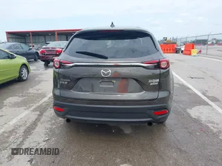 2017 Mazda CX-9 Touring z VIN JM3TCACY7H0129335, wystawiony jako IAAI lot #42289926 z przebiegiem 60 425 mil mil oraz . Historia ofert i sprzedaży dostępna na DreamBid. Obrazek 17.
