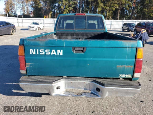 1995 Nissan Frontier XE z VIN 1N6HD16S9SC465896, wystawiony jako Copart lot #81665514 z przebiegiem 212 893 mil mil oraz Szkoda całkowita • Salvage title. Historia ofert i sprzedaży dostępna na DreamBid. Obrazek 6.
