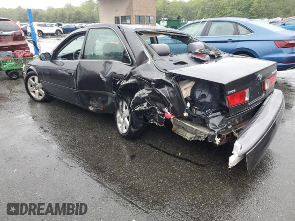 2000 Toyota Camry CE z VIN JT2BG22K7Y0479410, wystawiony jako Copart lot #57871825 z przebiegiem 222 941 mil mil oraz Czysty tytuł • Clean title. Historia ofert i sprzedaży dostępna na DreamBid. Obrazek 2.