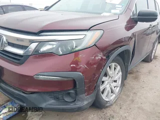 2019 Honda Pilot LX with VIN 5FNYF5H12KB023764, listed as a IAAI auction lot 41589629 with 66,879 mi miles. Bid and sale history available at carsss.com. Image 6.