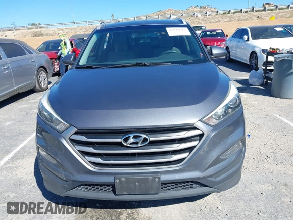 2018 Hyundai Tucson SEL with VIN KM8J3CA42JU618764, listed as a IAAI auction lot 41677046 with 127,980 mi miles. Bid and sale history available at carsss.com. Image 12.
